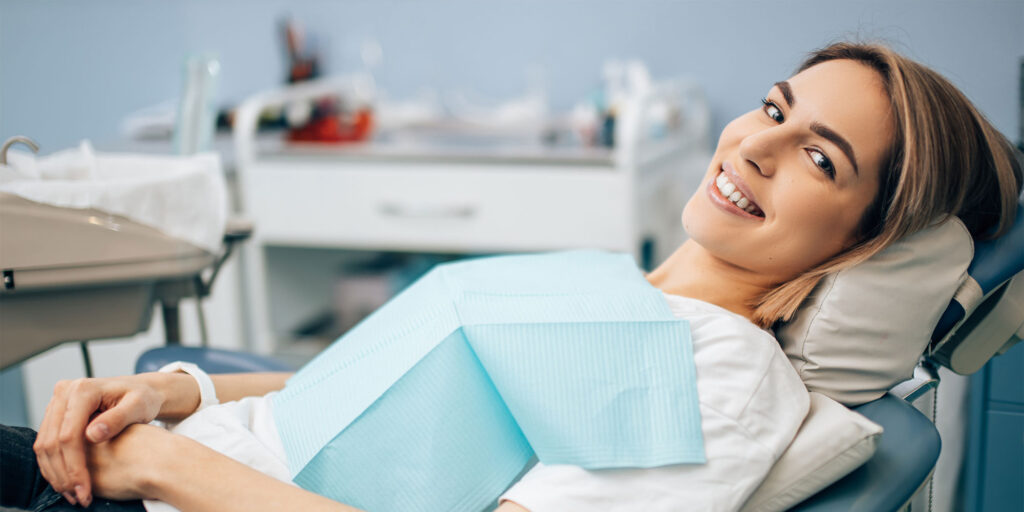 periodontal patient at dentist in exam chair